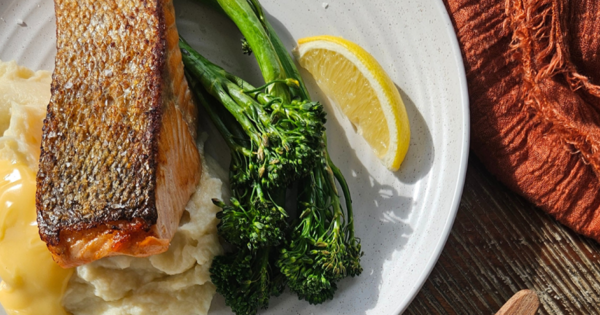 CRISPY SKINNED PETUNA SALMON WITH MASHED POTATO, BROCCOLINI, AND HOLLANDAISE SAUCE